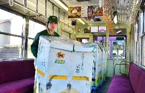 Kyoto tram used for parcel delivery