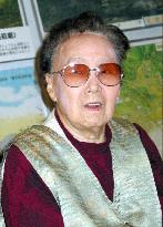 Japan's 1st female 'bus guide' dies at 98
