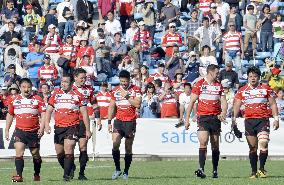 Yamada's brace brightens Japan's lackluster win over Hong Kong