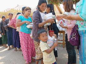 Myanmar civilians fleeing conflict get rations