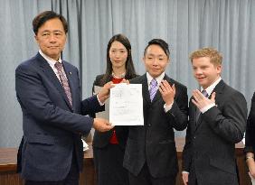 Tokyo's Setagaya Ward mayor gets same-sex couple's petition