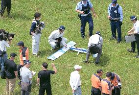 Model plane crashes electrical wire for Shinkansen bullet trains