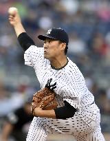 Tanaka beats Red Sox for 8th win