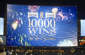 Yankees get 10,000th total win, berth on AL playoff