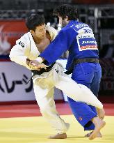 Takato wins men's 60-kg title