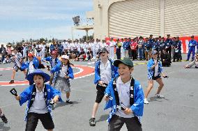 Japanese children dance on Antarctic boat