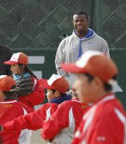 Griffey coaches children in Japan
