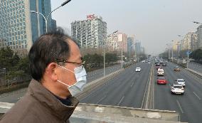 Vehicle restrictions in smog-hit Beijing