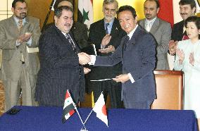 Japan signs accord to waive 710 bil. yen loans to Iraq