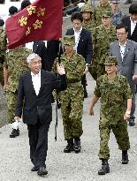 Japan defense chief inspects live-fire drill at Mt. Fuji range