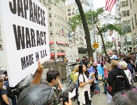 30 people rally in N.Y. to oppose to Japan's new security laws