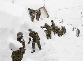 Heavy snowfall in Japan leads to relief efforts by ground troops