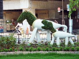Images of radish-like horses on display in Tokyo sculpture garden