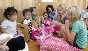 Young American sisters visit nursery in 2011 disaster-hit Ishinomaki