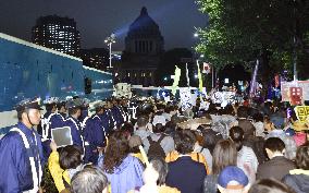 Japan's security bills clear upper house panel