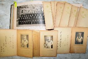 Japanese man seeks to return WWII Navy soldiers' photos to kin