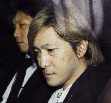 Music producer Komuro arrested for fraud