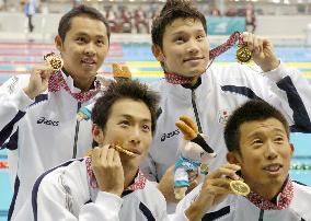 Japan wins 4th straight title in men's 4x100 medley relay