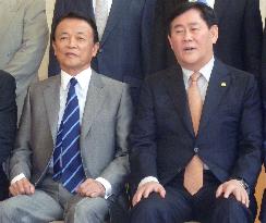 Japan, S. Korea finance ministers agree to boost economic ties