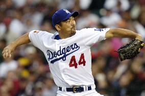Former major league closer Saito to retire