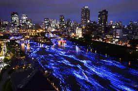 "Milky Way" appears on river in Osaka