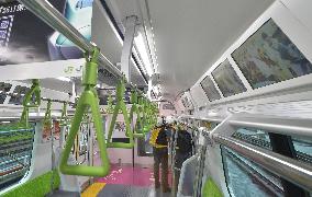 New Yamanote train keeps hanging ads