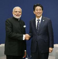 Abe meets Modi on sidelines of climate summit