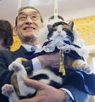 Stationmaster cat Tama presented with own train