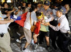 Anti-China protesters demonstrate against Beijing envoy