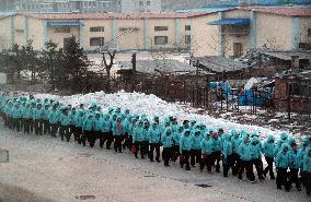 N. Korean laborers head to work in China economic zone across border