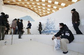 New station building in tsunami-hit northeast Japan town has spa