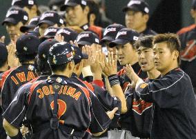 Japan advances to WBC 2nd round by beating S. Korea 14-2