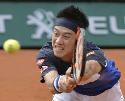 Nishikori powers into French Open quarterfinals for 1st time