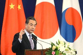 FM Wang sees history issues as unavoidable at 3-nation summit