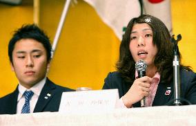Olympic medalists protest budget cut plan