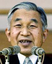 Emperor Akihito greets public on 72nd birthday, worried by snowf