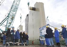 NRA members inspect levee of Onagawa nuclear power plant