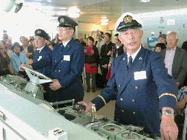 Ex-sailors of decommissioned ferry reenact departure for 50th anniv.