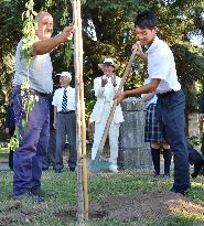 Japanese high school boy plants cherry tree at pope's summer retreat