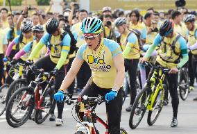 Thousands join bike ride to mark Thai king's birthday