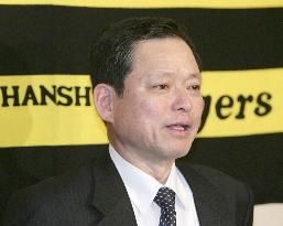 Hanshin accepts bid for Igawa