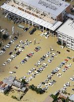 Parking lot, office building flooded in eastern Japan city