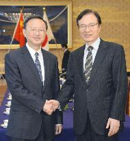 China's top diplomat Yang meets Abe aide Yachi to promote dialogue