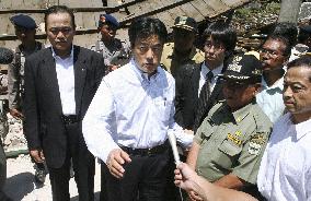Okada inspects earthquake damage in Indonesia
