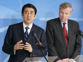 Abe tells NATO Japan won't shy from sending troops for int'l pea