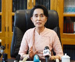 Myanmar's Suu Kyi warns against postponing general election