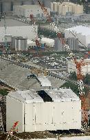 Work begins to dismantle cover at Fukushima plant