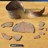 Earthenware fragments from 9th-century salt-making facility