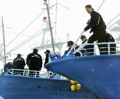 Coast Guard inspects boats bearing bullet marks