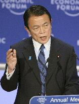 Aso pledges $17 bil. in aid to Asia to help counter crisis